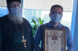 Награждение Патриаршей грамотой благотворителя